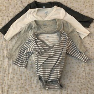 Bundle of four 0-3 month long sleeve onesies